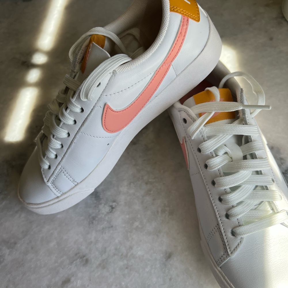 Nike White and Pink Sneakers Classic Low-Top Design